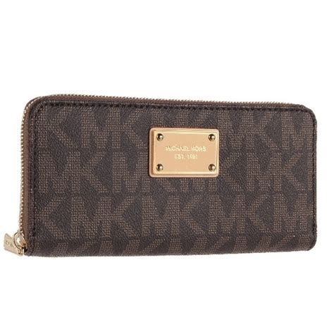 michael kors logo zip continental pvc wallet brown|Michael Kors large continental wallet.